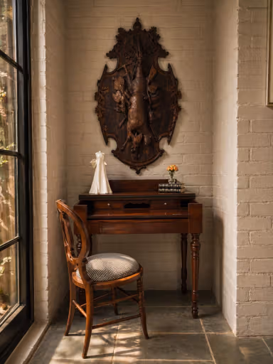 Wedding gown sculpture on an antique desk