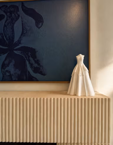 Wedding gown sculpture on a cabinet